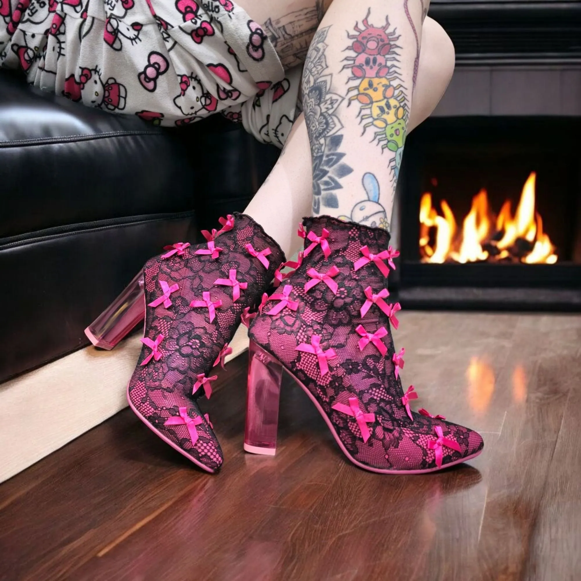 Rubina Portrait Mode Booties W/ Transparent Heel & Bow Accents