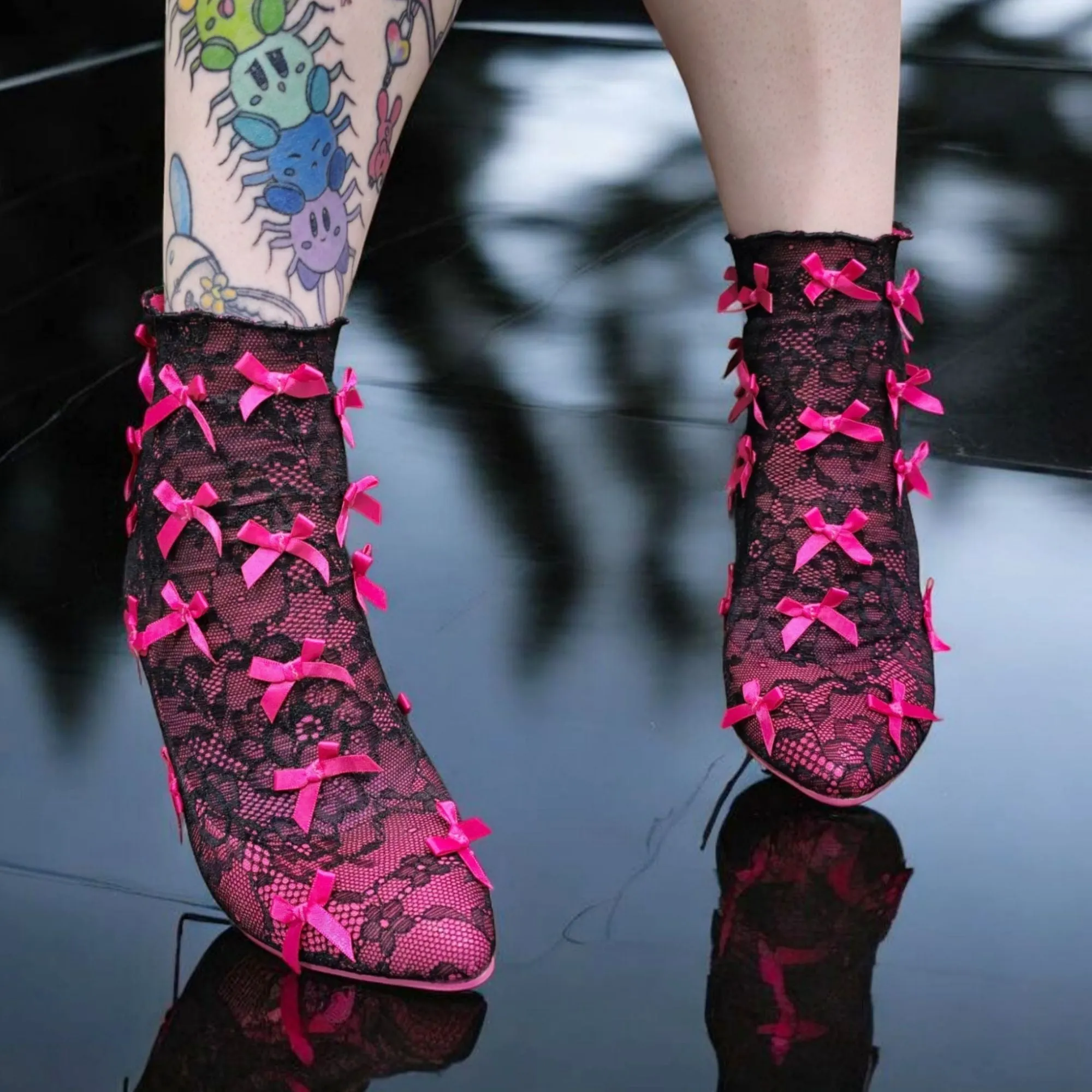 Rubina Portrait Mode Booties W/ Transparent Heel & Bow Accents